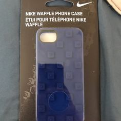 the phone case is made out of lego blocks and has a blue logo on it