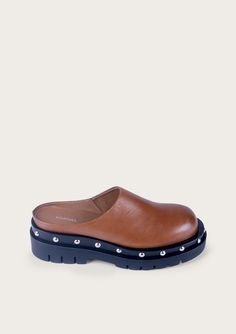 Upper: 100% Bovine leather Linning: Leather Inner Sole: Leather Sole: P/U Heel Height: 3 cm Fit Comments: Half sizes should size up if regular-wide width or size down if narrow width Brown Calf Leather Mules With Removable Insole, Classic Brown Calf Leather Mules, Brown Slip-on Mules With Studded Rubber Outsoles, Brown Slip-on Mules With Studded Outsoles, Casual Brown Calf Leather Mules, Leather Mules For Work With Stitched Sole, Brown Leather Mules With Leather Lining, Brown Leather Sole Mules For Work, Business Brown Mules With Leather Sole