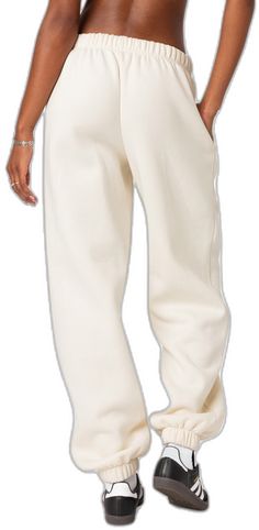 Oversized Cotton Joggers For Fall, Oversized Cotton Sporty Joggers, Cotton Sweats With Pockets For Loungewear, Cotton Sweatpants With Straight Hem For Fall, Fall Cotton Sweatpants With Straight Hem, Oversized Cotton Joggers With Ribbed Cuffs, Oversized Sweats With Elastic Waistband, Oversized Joggers With Elastic Waistband, Cotton Tapered Leg Sweats For Fall