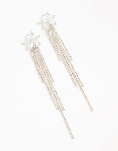 Get ready to shine with these captivating diamante drop earrings. With a dazzling cup chain design and floral silver elegance, they add a touch of glamour to any outfit. These shimmering stunners are sure to turn heads and steal the spotlight. Material: Crystal Dimensions: Length 100 mm x Width 13 mm | Lovisa Diamante Floral Cup Chain Drop Silver Earrings, Clear White Gold Crystal Bridal Earrings For Party, Glamorous White Gold Bridal Earrings, Party Crystal Chandelier Earrings In White Gold, Party White Gold Crystal Chandelier Earrings, Silver Long Drop Earrings With Sparkling Stones, Silver Long Drop Linear Earrings With Sparkling Stones, Glamorous Silver Crystal Linear Earrings, Glamorous White Gold Crystal Earrings, Dangle Diamond Linear Earrings For Party