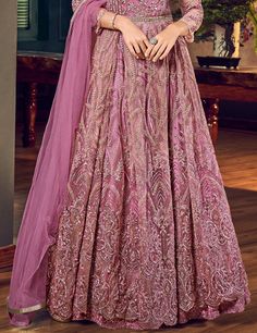 COLOR : Charm Pink FABRIC : Top - Net, Bottom (Lehenga) - Satin, Inner - Santoon, Dupatta - ChiffonWORK : Heavy Resham Work, Tonal Glitter Cord, Sequins, Stones, Motifs, Lace Border OCCASION : Wedding, Reception, Engagement READY-TO-WEAR : NoSTITCHING : Available as semi-stitched fabric, can be stitched using standard size option (+$30). Note: There might be a slight color variation due to lighting and flash used during photoshoot. The bright shade seen is the best closer view of fabric's color. Semi-stitched Maxi Lehenga With Intricate Embroidery, Floor-length Gown With Dori Work For Diwali, Floor-length Anarkali Choli With Resham Embroidery, Anarkali Floor-length Dupatta With Intricate Embroidery, Anarkali Style Floor-length Embroidered Dupatta, Embroidered Floor-length Lehenga For Eid, Floor-length Resham Embroidery Anarkali Choli, Floor-length Embroidered Choli For Eid, Floor-length Churidar With Dori Work For Reception