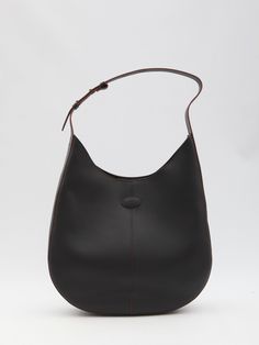 This black leather Medium Tod's Di Bg Hobo bag showcases the embossed Tod's logo on the front and comes equipped with an adjustable handle, snap-button closure, one main interior compartment, and a detachable zipped pouch. Its interior is lined with suede.    Dimensions: 14.9x15.7x3.9 inches  Medium size  Logo detail  Adjustable strap  Snap closure  Suede lining  Detachable zip pouch  Size nationality: UNI  Product code: XBWDBSR9300YATB999  Composition: 100% leather Tods Bag, Tods Shoes, Timeless Wardrobe Staples, Messenger Bag Backpack, Gorgeous Bags, Sneaker Wedge, Italian Luxury, Card Holder Leather, High End Fashion