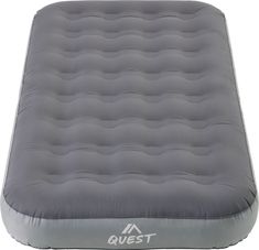 an inflatable mattress with the word quest written on it's front side