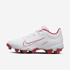 a pair of white and red nike cleated shoes on a white background,