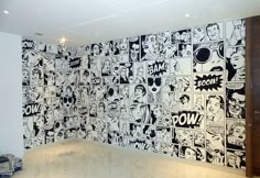 a room with comic panels on the wall