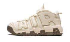 The Nike Air More Uptempo "Coconut Milk" is a versatile and neutral-based colorway of Scottie Pippen’s iconic signature shoe.  The “Coconut Milk” Air More Uptempo is yet another popular release for the old school hoops shoe that was worn by “Pip” with the Chicago Bulls in 1996.  The shoe features a Coconut Milk canvas construction with tonal, oversized “AIR” branding on the sides in leather.  A tonal Swoosh is embroidered on the toe while a jeweled version of the iconic Nike branding is found on Nike Air More Uptempo, Nike Air More, Retro Basketball, Scottie Pippen, Lifestyle Shoes, Nba Season, Stadium Goods, Hot Sneakers, Swag Shoes