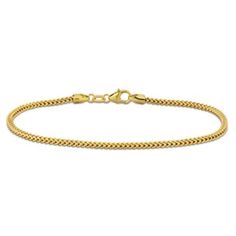 A great gift for people who admire glam, this gorgeous Franco Link Bracelet would be an ideal choice. This stunning bracelet is crafted in lustrous 10-karat yellow gold and measures 9-inches in length. Polished to a brilliant shine, this charming bracelet is secured with a lobster clasp. Coordinate with a matching necklace for a flawless ensemble. | Belk & Co 1.85MM Franco Link Bracelet in 10K Yellow Gold Charming Bracelet, Jewelry Bracelets Gold, Gold Anklet, Link Chain Bracelet, Unique Bracelets, Fine Jewelry Bracelets, Yellow Gold Bracelet, Gold Plated Bracelets, Chain Anklet