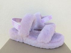 UGG FLUFF OH YEAH SLIDE SLIPPERS ~ NEW IN BOX WOMEN'S SIZE US 11/ EUR 42/ UK 9 ~ FITS US 11-11.5/ EUR 42-42.5/ UK 9-9.5  STYLE # 1107953  COLOR: CALIFORNIA ASTER ~MY ITEMS ARE ALWAYS AUTHENTIC, PLEASE SEE MY TRUSTED FEEDBACK Both indoor and outdoor use Fully covered and lined with sheepskin Stretch UGG logo heel strap Genuine sheepskin UGG logo sock liner ( insole) that naturally wicks away moisture and helps keep your feet dry, warm and cozy 1 1/2" sole with a rubber bottom Please see the pictures for more detail Inside size tag and box upc have been marked to prevent retail store returns Please note, most UGGs are now made in China and Vietnam. NONE are made in Australia PLEASE SEE MY OTHER LISTINGS  PLEASE READ: MY ITEMS ARE ALWAYS AUTHENTIC, THIS PAIR HAS THE UGG 2020 HOLOGRAM I BUY AL Sheepskin Ugg, Ugg Tasman, Sheepskin Slippers, Slide Slippers, Ugg Slippers, Platform Slippers, Oh Yeah, Ugg Classic, Liner Socks