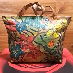 Very Gently Preloved - Stylish Multicolored Genuine Leather - Hand Painted Handbag - With Floral Print Design - Top Zip Closure - Multiple Inside Slides - One Zip - Two Outside Zip Pockets - All Reasonable Offers Welcome! Anuschka Handbags, Painted Handbag, Floral Print Design, Red Green, Zip Pockets, Slides, Tops Designs, Floral Print, Genuine Leather