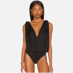 Free People Intimately 'Night Owl' Bodysuit Brand New With Tags Attached - No Faults Love This But It Does Not Fit Me ): Size: Medium Color: Black An Apparel That Fits You Well! The Free People Night Owl Bodysuit Keeps It Chic And Minimal. Plunging V-Neckline And Sleeveless Style. Pull-On Style. V Back. 98% Polyester, 2% Elastane. Info: Originally: $68 V-neck Bodysuit For Night Out With Lined Body, Backless Solid Bodysuit For Date Night, Solid Backless Bodysuit For Date Night, Backless Solid Color Bodysuit For Date Night, Solid Color Backless Bodysuit For Date Night, Sleeveless Flirty Bodysuit For Date Night, Flirty Sleeveless Bodysuit For Date Night, Chic Black Low-cut Bodysuit, Elegant Low-cut Bodysuit For Night Out