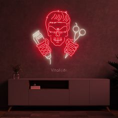 a neon sign with a skull holding a hairdryer in it's hands