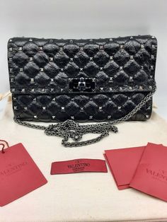 Authentic, brand new Valentino Garavani Rockstud Spike black leather crossbody bag/clutch/ wallet on a chain. Quilted leather 8 credit card clots 9" x 5.3" x 1.7" Made in Italy $2200 Black Leather Crossbody Bag, Valentino Rockstud, Quilted Leather, Clutch Wallet, Valentino Garavani, Leather Crossbody Bag, Leather Crossbody, Bags Handbags, Crossbody Bag