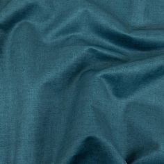 an image of a teal blue fabric texture that is very soft and smooth to the touch