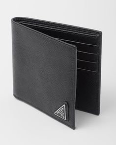 Enameled metal triangle logo Eight card slots Two bill compartments Moire and Saffiano leather lining Leather Wallet Men, Prada Saffiano, Luxury Wallet, Prada Wallet, Triangle Logo, Wallet Men, Leather Wallet, Card Slots, Metallica