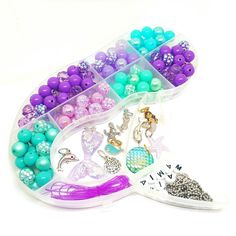 This adorable mermaid bead container includes everything needed to make your own nautical jewelry! This set includes 3 sets of alphabet beads (one name), 2 ball chain necklaces, an assortment of charms, apx 8 feet of stretch cord and apx 150 10mm acrylic beads all in a mermaid shaped bead container. Supplies included may vary. Each craft kit makes 3 name bracelets, 2 necklaces and apx 5 additional bracelets (depending on the bracelet size needed). Not quite what you are looking for? Request a cu Resin Mermaid, Ballerina Jewelry, Name Bracelets, Mermaid Party Decorations, Valentine Day Boxes, Mermaid Bracelet, Little Mermaid Birthday, Mermaid Theme Birthday, Birthday Bracelet