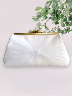 "This clutch features a beautiful tulle and satin fabric for the exterior and optional personalized photo lining and inscription on the inside. An elegant gift for the bride, bridesmaid, mother or mother in law. Perfect purse to carry on your wedding day.  Dimensions: 5\" high 7\" across the top  8.5 across bottom  2.5\" deep Gold color metal clasp opening on top.  Exterior fabric: satin and tulle Interior fabric: Off white cotton. If you would like different color, please contact to request.  P Elegant Organza Bridal Accessories For Ceremony, Wedding Evening Bag With Satin Lining, Elegant Evening Bag With Satin Lining For Wedding, Elegant Evening Bridal Accessories With Tulle, Elegant Evening Bridal Accessories In Tulle, Elegant Tulle Bridal Accessories For Evening, Elegant Evening Tulle Bridal Accessories, White Tulle Bridal Accessories For Evening, Elegant White Clutch For Ceremony