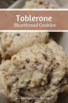 two cookies are stacked on top of each other with the words toblerone shortbread cookies