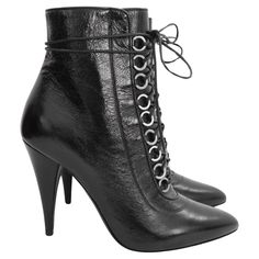 Fabulously fierce Saint Laurent Fetish 105 textured leather ankle boots - bought for $1250 and unworn with dustbag. Made from glossy, textured black leather with bondage inspired ring eyelets and long laces. Have connected shaped heels and side zips. Size 36.5/Uk3.5. Measure approx 10” heel to toe and heel 4” Cat Boots, Lace Up Heel Boots, Designer Ankle Boots, Pointy Toe Boots, Real Leather Boots, Black Lace Up Boots, Womens Designer Boots, Genuine Leather Boots, Leather Heeled Boots