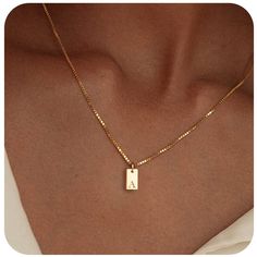 ❈ Make a subtle statement with our rectangle Gold Bar Letter Necklace – the ultimate accessory for trendsetters who love to rock their individuality with a touch of glam! Crafted from alloy steel and dipped in 18 karat gold electroplating, this necklace is a sleek and chic addition to your jewelry collection. The rectangular gold bar pendant exudes modern vibes, making it the perfect canvas to showcase your personality through a custom letter. Hanging from a stylish box chain at a sassy 20 inche Gold Bar Pendant, قلادات متدلية, Alfabet Letters, Initial Necklaces, Letter Pendant Necklace, Gold Name Necklace, Mens Jewelry Necklace, Clasp Necklace, Initial Pendant Necklace