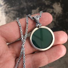 PENDANT STONE: Agate (natural) METAL : .925 Sterling Silver DIMENSIONS : 30 x 30 mm CHAIN: Byzantine King chain METAL : .925 Sterling Silver LENGHT: 55 cm - 21.65 inches THICKNESS: 3 mm - 0.1 inches Engraved Jade Pendant Jewelry, Round Agate Amulet Jewelry, Agate Round Pendant Amulet Jewelry, Round Agate Amulet Necklace, Silver Agate Amulet Necklace, Silver Round Jade Necklace, Silver Jade Round Necklace, Silver Agate Amulet Jewelry, Silver Medallion Necklace With Natural Stones