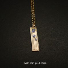 This daisy necklace is hand carved in the Mackintosh style and very dainty and elegant.Daisy is the birth flower of the month of April.Daisies symbolize innocence and purity. This stems from an old Celtic legend. According to the legend, whenever an infant died, God sprinkled daisies over the earth to cheer the parents up.In Norse mythology, the daisy is Freya’s sacred flower. Freya is the goddess of love, beauty, and fertility, and as such the daisy came by symbolize childbirth, motherhood, and Minimalist Flower Engraved Necklace, Etched Flower Pendant Necklace For Gift, Dainty Brass Necklace With Flower Pendant, Minimalist Flower-shaped Engraved Necklaces, Minimalist Flower-shaped Engraved Necklace, Dainty Brass Flower Pendant Necklace, Spiritual Flower Engraved Necklace, Elegant Brass Flower Necklaces, Elegant Brass Necklaces With Flower Charm