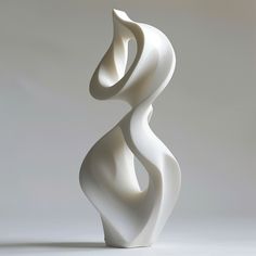 a white sculpture sitting on top of a table