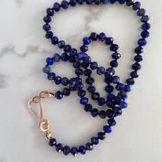 Blue Hand Knotted Jewelry For Gift, Blue Hand-knotted Jewelry For Gift, Blue Hand Knotted Round Bead Necklaces, Blue Hand-knotted Necklaces, Blue Hand-knotted Round Bead Necklaces, Sapphire Color Lapis Lazuli Necklace, Sapphire Colored Lapis Lazuli Single Strand Necklace, Sapphire Single Strand Necklace In Lapis Lazuli, Lapis Necklace