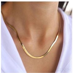 Elegant Gold Snake Chain Necklace, Herringbone Chain Necklace, Flat Snake Chain Choker, 14k Gold Plated, 925 Sterling Silver Discover the epitome of sophistication with our premium 925 Sterling Silver Necklace. Designed for the modern woman, our flat snake bone chain necklace exudes a luxurious aura that’s both timeless and contemporary. Embrace the essence of fashion with a piece that's in vogue, making a subtle yet bold statement. Key Features: Luxurious 925 Sterling Silver: Crafted with high- Snake Chain Gold, Gold Herringbone Chain, Flat Snake Chain, Gold Snake Chain, Herringbone Chain, Herringbone Necklace, Snake Chain Necklace, Gold Rope Chains, Silver Chain Style