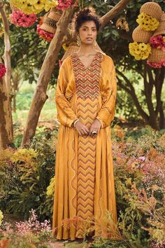 Mustard yellow kaftan with all-over bandhani prints featuring resham patra and coin  work.
Component: 1
Printed
Neckline: V-Neck
Sleeve Length: Full
Fabric: Satin Silk
Color: Yellow
Bandhani prints
Resham and patra work - Aza Fashions Kaftan Dress Indian, Velvet Kurta, Punit Balana, Bandhani Print, Printed Kaftan, Kaftan For Women, Yellow Satin, Dress Indian, Indian Fashion Designers