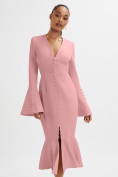 **IMPORTANT NOTE** This pre-order went live at 09:00 GMT on the 8th May. Introducing the must-have dress of the season: the SALMA Fluted Sleeve Longline Fishtail Midi Dress, now available in a stunning pink hue. Crafted from premium crepe fabric, this bestseller features a flattering fit-and-flare silhouette with a fis Elegant Midi Dress With Flared Hem, Pink Fitted Fishtail Dress, Elegant Pink Dress With Mermaid Hem, Elegant Pink Mermaid Hem Dress, Pink Ruffle Hem Midi Dress For Evening, Feminine Fitted Dresses With Mermaid Hem, Formal Pink Mermaid Hem Dress, Pink Midi Dress With Ruffle Hem For Evening, Pink Formal Dress With Mermaid Hem