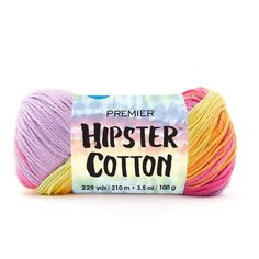 a skein of yarn with the words hipster cotton in pink, yellow and orange