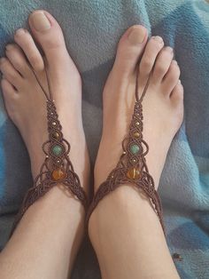 Gemstone Macrame Barefoot Sandals, Brown Citrine Aventurine Tiger's eye Foot Jewelry, Body accessories festival hippie pair anklets women gift This beautiful hippie style pair of barefoot sandals is created using the macrame technique. It is made by a high quality brown waxed thread and Citrine, Aventurine and Tiger's eye beads. Also, we use a brass beads to complete design.  Waxed thread gives the product durability and strength, and elegant natural appearance.  It's a beautiful gift and a nice accessory what you can wear every day.  Barefoot sandals characteristics: *Included a pair of barefoot sandals *This barefoot sandals is adjustable, with a sliding knot, so matched to any width of the anklet. *Citrine beads size are 10 mm, Aventurine beads 8 mm and Tiger's eye beads 6 mm *Brass bea Hippie Beaded Adjustable Anklets, Adjustable Hippie Anklets For Festival, Adjustable Hippie Style Anklets For Festivals, Handmade Adjustable Bohemian Anklets, Adjustable Hippie Style Festival Anklets, Bohemian Handmade Adjustable Anklets, Adjustable Spiritual Anklet For Festival, Adjustable Macrame Bohemian Anklets, Handmade Adjustable Spiritual Anklets