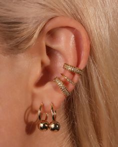 Bold and fierce, the Beloise ear cuff set is extremely modern and stylish in its character. Adorn this set on its own, or pair with other cuffs to make your outfit look extra sassy Chic Metal Ear Cuff, Gold Metal Trendy Ear Cuff, Trendy Gold Single Ear Cuff, Trendy Gold Ear Cuff With Matching Earrings, Adjustable Metal Trendy Ear Cuff, Trendy Adjustable Wrap Earrings For Party, Trendy Gold Cartilage Earrings, Trendy Metal Ear Cuff For Party, Trendy Gold Metal Piercings