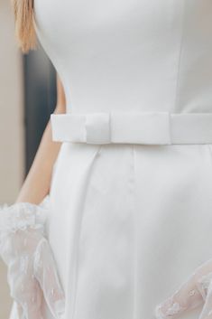 Beautiful satin bow belt. We love this modern but classic design. Pairs perfectly with our gorgeous Frankie. Elegant Bridal Belt With Satin Bow For Wedding, Elegant White Sash For Formal Occasions, Chic Satin Bow With Ribbon Details, Chic Satin Bow For Formal Occasions, Chic Satin Bow With Ribbon, Elegant Detachable Bow For Evening, Elegant Bridal Belt With Satin Bow For Party, Chic Satin Bow For Wedding, Elegant Bow With Bow Tie Back