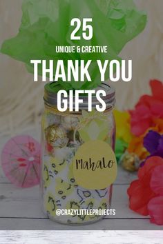 a mason jar filled with lots of colorful flowers and the words, 25 unique & creative thank you gifts