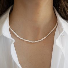 "This handmade pearl beaded necklace is made of delicate freshwater pearls. It's super chic and trendy! ♡【HIGHEST QUALITY MATERIALS】: Made of genuine freshwater pearls, and chain is 925 Sterling Silver with a thick plating of 14k Gold. Nickel-free & Hypoallergenic  ♡【ADJUSTABLE SIZE】: Measures 15\" + 3 \" extension chain to fit your neck perfectly, you can adjust the length according to your preference.  ♡【CHIC DESIGN】: This pearl necklace is fully handmade and looks so elegant and will match beautifully with any outfit!  ♡【PERFECT GIFT】: It is beautifully packaged and ready for gift giving.  Made with 100% Pure Love! 🥰 Let's Connect! 🥰 IG: samijewels_" Minimalist Beaded Necklace With Pearl Drop, Everyday Beaded Pearl Necklace, Minimalist Beaded Necklaces With Pearl Charm, Minimalist Pearl Beaded Necklaces With Tiny Beads, Minimalist Pearl Beaded Necklace With Tiny Beads, Delicate Pearl White Beaded Necklace With Round Beads, Dainty Everyday Beaded Pearl Necklace, Minimalist Handmade Pearl White Necklace, Delicate Pearl White Beaded Necklace