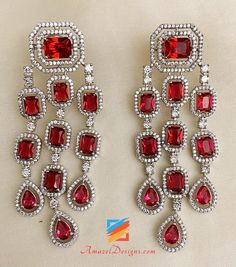 Red Mehroon American Diamond (AD) Earrings. Available to shop online and delivered to your doorsteps anywhere in the world with our Everything-Everywhere FREE Shipping. 📦Unmatched FREE Worldwide Shipping EXPLORE more Indian Earrings and Jhumki Earrings. Maang Tikka Sets and Tikka Set Punjabi AMERICAN DIAMOND JEWELLERY Match with our pretty Single Line Necklaces Deepika, USA ⭐️⭐️⭐️⭐️⭐️ Thank you Thank you Thank you!! If I fell in love with the pictures, then I’m absolutely floored after seeing t Red Frock, Ad Earrings, Maang Tikka Set, American Diamond Jewellery, Jhumki Earrings, Maang Tikka, Earring Designs, Traditional Earrings, Bride Earrings