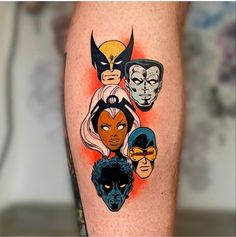 an image of some tattoos on someone's leg that has different characters on it