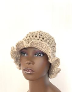 FREE WORLDWIDE SHIPPING ON ALL ITEMS For a limited time only. Welcome to my shop, all items handmade by me with passion READY TO SHIP I hand crocheted this lovely wavy cloche hat in the finest, softest oatmeal high quality woolblend yarn. One size fits all. Middle section is a beautiful lace effect pattern. Suitable for summer or winter wear. Guaranteed to add style to any wardrobe:) All items come with a gift tag and ribbon attached ready to be given as a gift. ❤️Shipping times: This item is re Bohemian Cloche Hat For The Beach, Brown Hand-knitted Crochet Hat For Beach, Brown Hand Knitted Crochet Hat For Beach, Bohemian Knitted Short Brim Hat, Bohemian Hand-knitted Crochet Hat, One Size, Bohemian One Size Cloche Hat For Beach, Bohemian One-size Cloche Hat For The Beach, Bohemian Brimmed Beige Bucket Hat, Bohemian One-size Cloche Hat For Beach