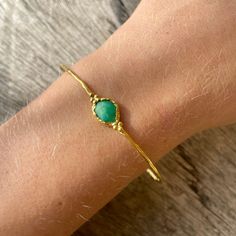 Gorgeous gold plated sterling silver cuff bracelet set with either a Kyanite, Turquoise or Chrysoprase gemstone. The entire bracelet has a lightly hammered finish. These gorgeous dainty cuff bracelets are perfect to stack with other bracelets and can be slightly adjusted. Cuff width: 65 mm (slightly adjustable... Squeeze to fit) Take a look at our Pebbles & Chance ETSY store https://www.etsy.com/es/shop/pebblesandchance to combine it with other unique, raw, beautiful, precious pieces! Follow Gemstone Bangle, Gold Bracelet Cuff, Gold Cuffs, Turquoise Cuff, Sterling Silver Cuff Bracelet, Sterling Silver Cuff, Gold Bangles, Gold Plated Sterling Silver, Delicate Bracelet