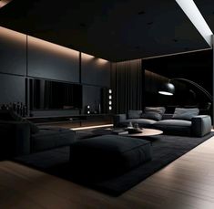 a modern living room with black furniture and lighting on the ceiling is lit by recessed lights