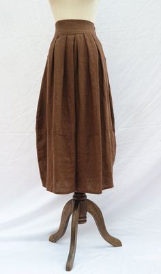 " *Elastic waist *Pleated skirt *two pockets at each side *Length approx 80cm/31.5\" *Wash by hand or machine with cold water Auailable in women's us size XXS to 3XL as well as custom size and plus size  XXS: Waist:66cm/26\" Length:80cm/31.5\" XS: Waist:70cm/27.5\" Length:80cm/31.5\" S: Waist:74cm/29\" Length:80cm/31.5\" M: Waist:78cm/30.5\" Length:80cm/31.5\" L: Waist:82cm/32\" Length:80cm/31.5\" XL: Waist:86cm/33.8\" Length:80cm/31.5\" XXL: Waist:90cm/35.5\" Length:80cm/31.5\" 3XL: Waist:94cm/ Custom Skirt, Long Brown Skirt, Casual Summer Skirt, Fall Winter Capsule Wardrobe, Long Linen Skirt, Victorian Skirt, Handmade Skirts, Brown Skirt, Skirt For Women