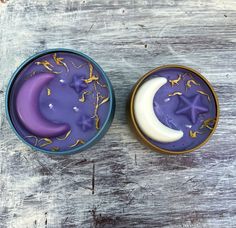 two tins with moon and stars on them