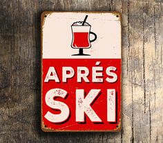 a red and white sign that says apres ski with a glass of beer on it