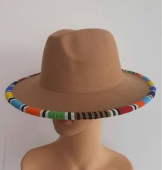 This is a spectacular Yellow rim beaded unisex high quality fedora hat that are hand beaded on the BRIM . It makes one stand out in occassions such trips ,weddings ,birthdays . We use very stunning beads and the craftmanship is very unique Head circumference can fit a size: 57/58cm Beaded Multicolor Beach Hats, Multicolor Beaded Beach Hat, Multicolor Beaded Hat With Curved Brim, Beaded Multicolor Summer Hats, Multicolor Beaded Summer Hat, Summer Multicolor Beaded Hats, Beaded Brown Wide Brim Hat, Multicolor Beaded Brimmed Hat, Brown Beaded Wide Brim Hat