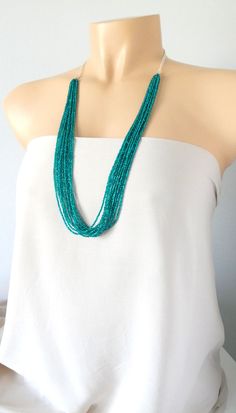 "Long boho beaded necklace, emerald green. The necklace has no clasp and it is super easy to put on over your head. Measures 30 inches. More emerald items: https://www.etsy.com/shop/StephanieMartinCo?ref=simple-shop-header-name&listing_id=158993764&ga_search_query=stephanie%2Bmartin&search_query=emerald ❤ PROCESSING AND SHIPPING Most orders are made and shipped out in one business day. Please check delivery timeframes for your location on the description below. ❤ CUSTOM ORDERS If you like this i Cheap Green Multi-strand Necklaces, Cheap Colorful Beads Long Necklace, Cheap Green Double Strand Beaded Necklace, Boho Beaded Necklace, Long Boho Necklace, Emerald Green Necklace, Necklace Emerald, Long Necklace Boho, Emerald Bead