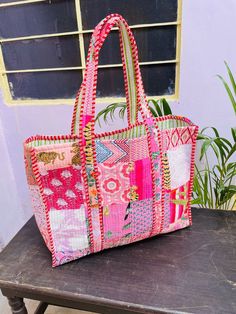 "floral multi patches quilted Cotton  block print weekend tote  bags  100% cotton fabric SIZE:  medium :  14 \" x  12\" x 3.5\" inches  large :  16  inches  x 14  inches  x 4\" inches  Big Size : 18 Inch x 18 Inch x 5.5 inches   the bags feature one inside pockets     :Color : Assorted & We Have More Color  : Quilted Padding   great for weekend getaways, beach trips and as carry on bags while travelling Ask me for custom orders, personalized pouches or wholesale  CARE: Machine wash separately in Red Patchwork Tote Bag, Multicolor Cotton Patchwork Bags, Travel Cotton Bag With Patchwork, Pink Patchwork Bag For Everyday Use, Pink Quilted Rectangular Shoulder Bag, Green Rectangular Shoulder Bag With Patchwork, Cotton Patchwork Tote Bag, Patchwork Cotton Travel Bag, Cotton Patchwork Bag For Travel