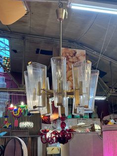 a chandelier hanging from the ceiling in a store