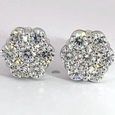 * Size - 8mm * Precious metal - 92.5 sterling silver   * Gemstone - Moissanite  * Carat weight - 2 carats each ear - total weight 4 carats  * Setting - Prong set by hand  * Closure type - Screw Backs  * Guarantee you These are one of the most beautiful earrings you would ever wear ! The shine truly speaks for itself , lots of stones were set in a flower style setting giving you crazy amounts of fire and shine ! We have these earrings IN HAND and ready to ship out SAME DAY ! https://www.youtube.c Anniversary Cubic Zirconia Cluster Earrings, Sterling Silver Cluster Earrings With Brilliant Cut For Anniversary, Silver Brilliant Cut Cluster Earrings, Anniversary Sterling Silver Cluster Earrings With Brilliant Cut, Anniversary Cluster Earrings With Brilliant Cut Sterling Silver, Sterling Silver Cluster Diamond Earrings For Anniversary, Silver Moissanite Cluster Earrings, Anniversary Round Cut Cubic Zirconia Cluster Earrings, Sterling Silver Cluster Earrings For Anniversary