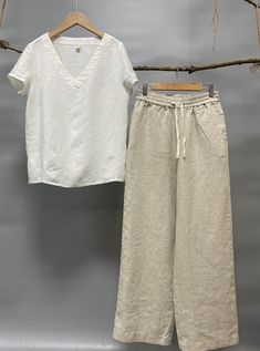 "Classic yet chic relaxed fit linen pants is your wardrobe smart staple. Our Ocean pants are made from 100% linen fabric in earth tone colors, enriching season-spinning versatility from home to office, work to leisure. -100% linen -Straight silhouette -Easy, comfortable, and just right voluminous. -Flat front -Pull-on style -Elastic waistband with pull ribbon (Optional) -2 side welt pockets -Color in listing: Chocolate, Black, Burnt Orange, White, Teal Please provide your natural waist, lower hi Classic Cotton Work Pants, Luxury Flax Pants For Summer, Affordable Light Wash Cotton Pants, Luxury Linen Straight Kurta Set, Casual Pants For Daywear, Affordable Summer Pants With Button Closure, Affordable Wide-leg Cotton Pants, Linen Pants 2022, Pants For Women Linen